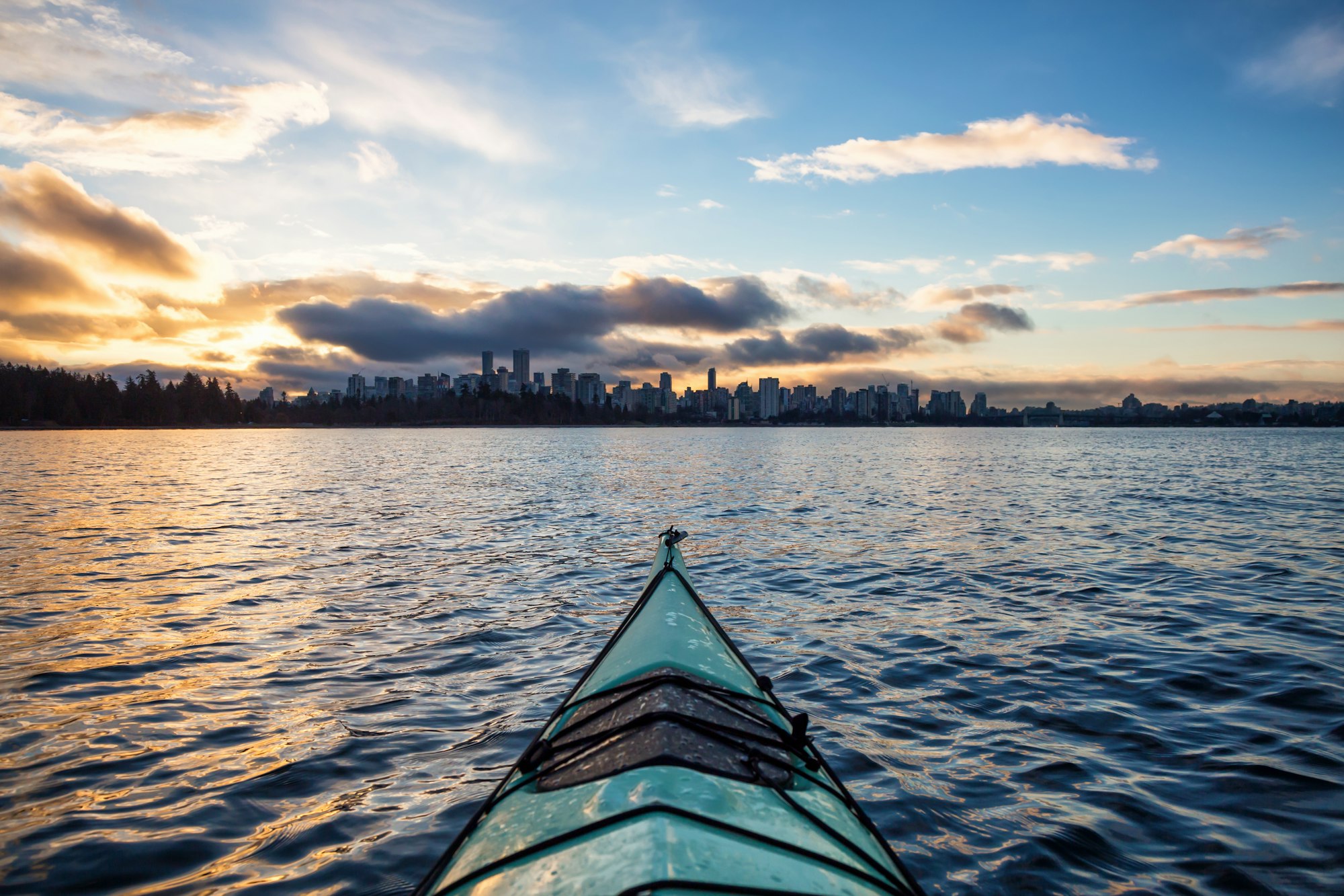 Kayaking around Vancouver with Downtown Skyline in the background